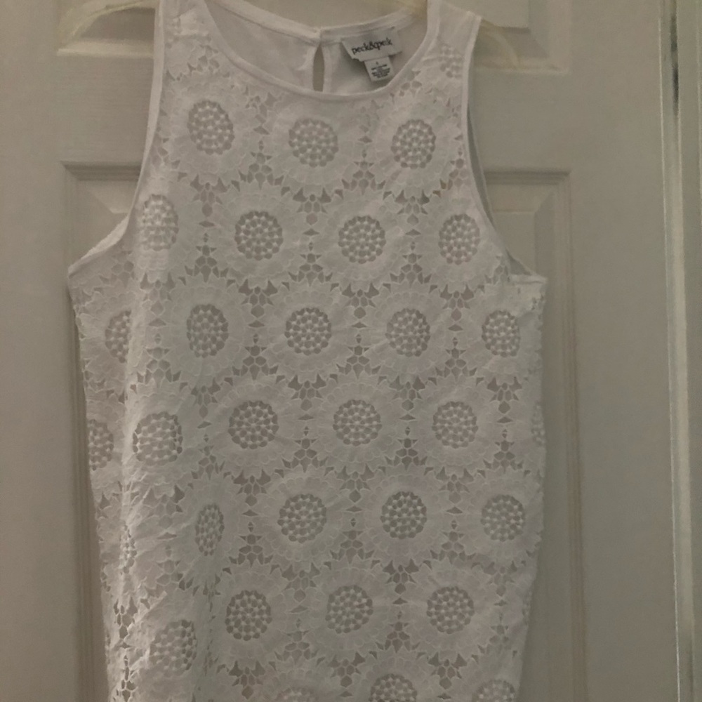 Sleeveless tunic style top. New with tags.